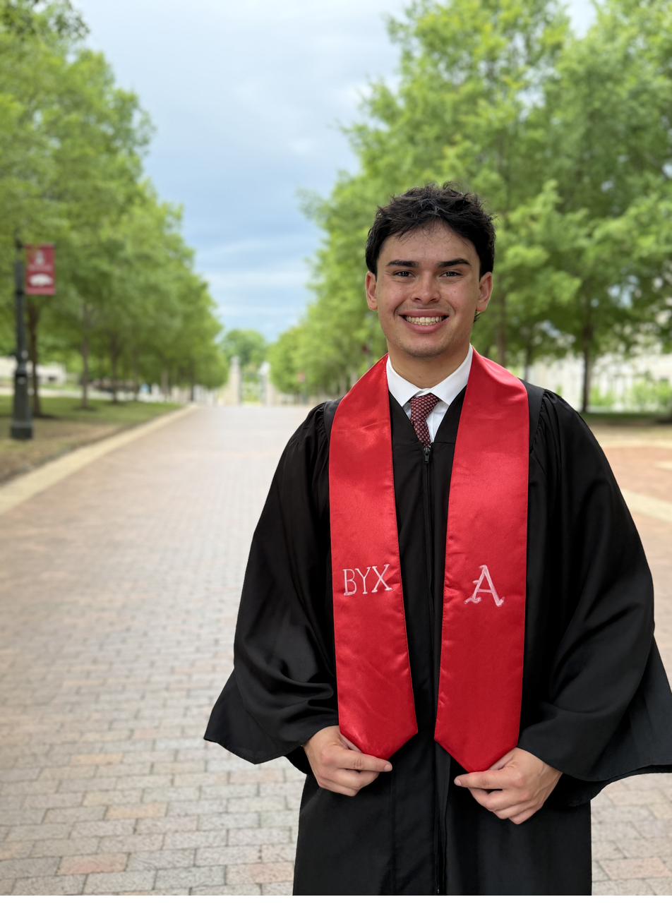 Portrait of Caleb Alexander Oliva at University of Arkansas graduation